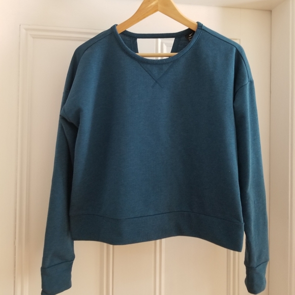 Nike Tops - Nike Cropped Sweater. Open Back. Size Medium. Excellent Condition.